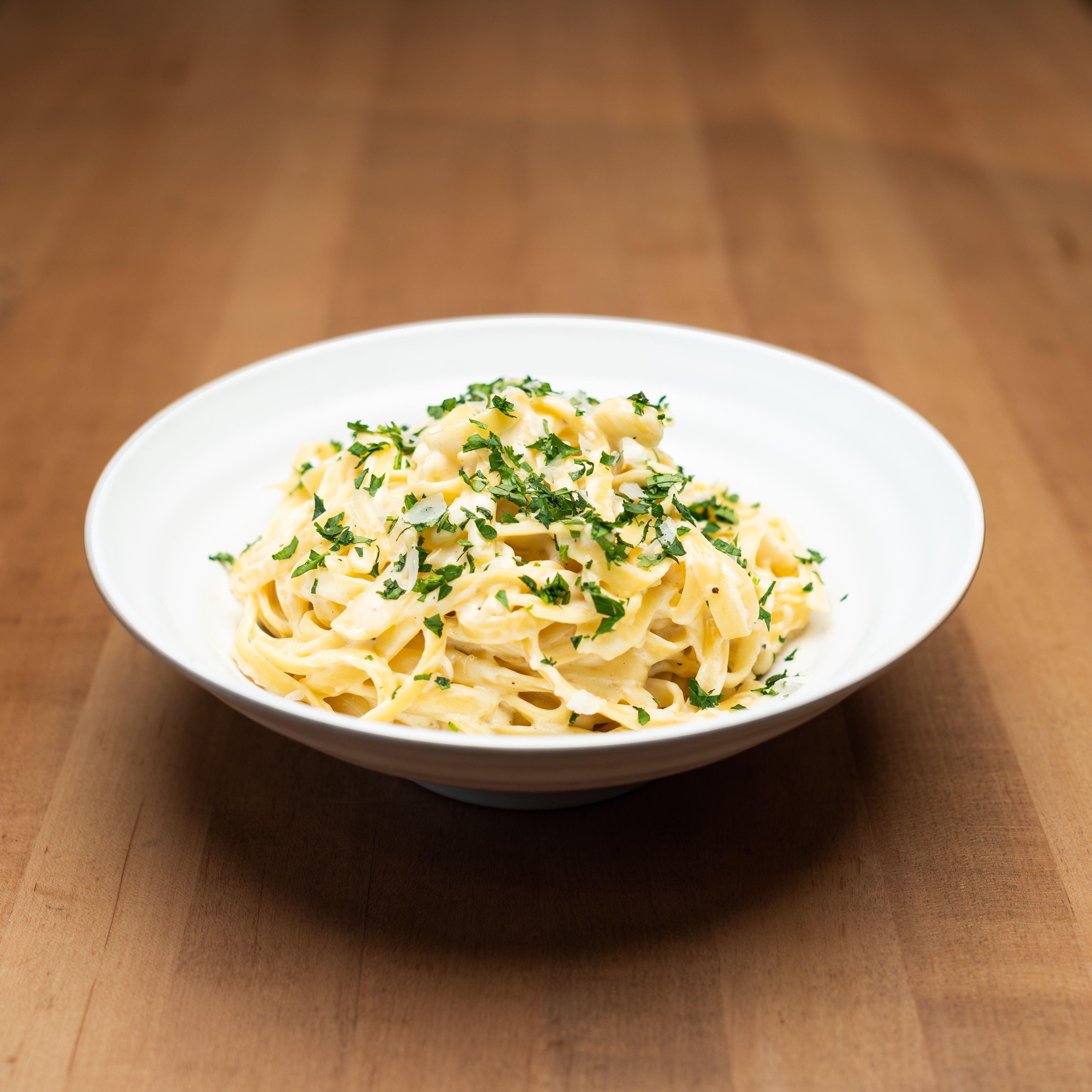 Fettuccine Alfredo - Our signature Alfredo sauce — made with real cream...